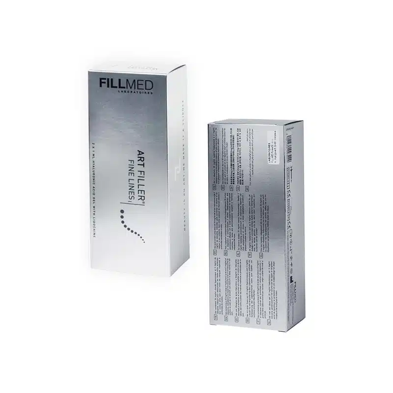 Two boxes of FILLMED® ART FILLER FINE LINES with Lidocaine, a cosmetic injectable product. One box is shown from the front, displaying the product name, while the other is shown from the side, listing ingredients or instructions. Both boxes have a sleek, metallic design.