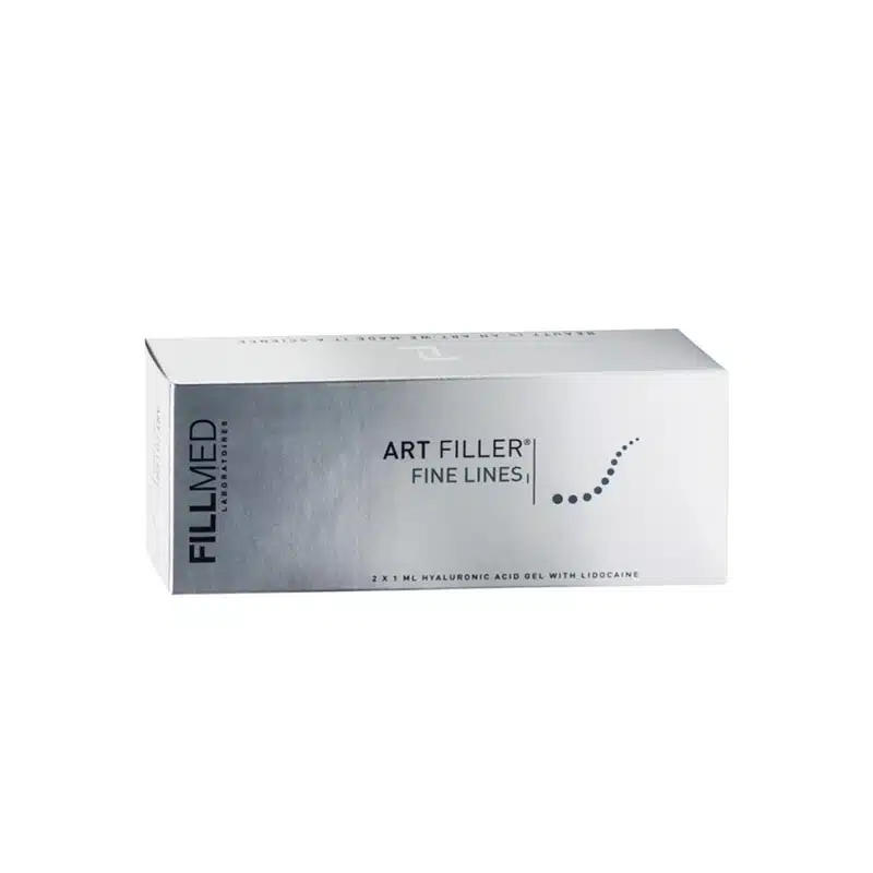 A rectangular box with a silver finish, labeled "Fillmed Laboratories" on the left side and "FILLMED® ART FILLER FINE LINES with Lidocaine" in the center. The bottom of the box states "2 x 1 mL hyaluronic acid gel with lidocaine." The design includes a dotted, curving line.