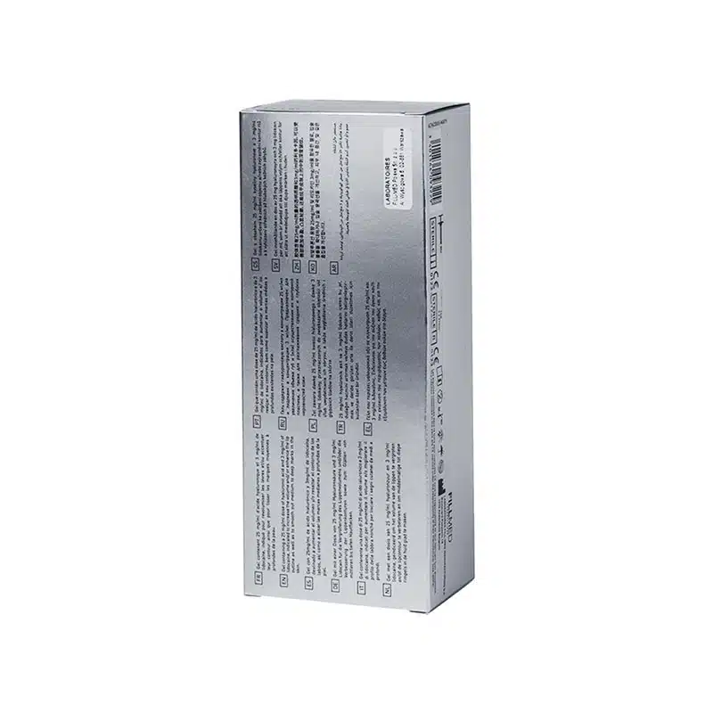 A silver rectangular box with various instructions and information printed in black text covering the surface. The text is in multiple languages. A barcode is visible near the top of the box on the narrower side. The product name, FILLMED® ART FILLER LIPS with Lidocaine, is displayed prominently.