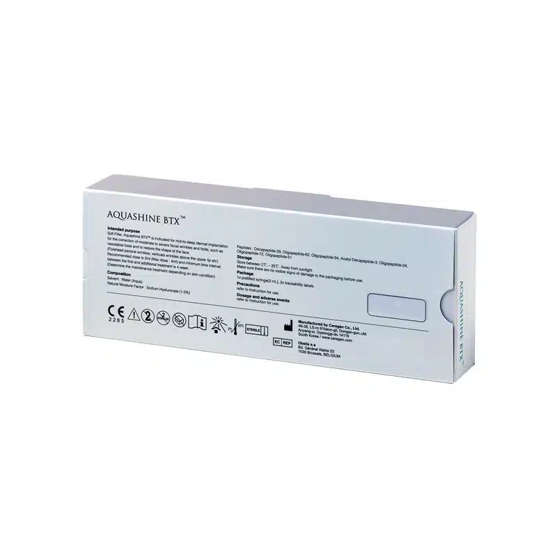 The image shows the back of a product box for REVOFIL AQUASHINE PTX. The white box displays various information, including usage instructions, a list of ingredients, manufacturer details, and several symbols indicating handling and safety guidelines. The box is viewed from a slight angle.
