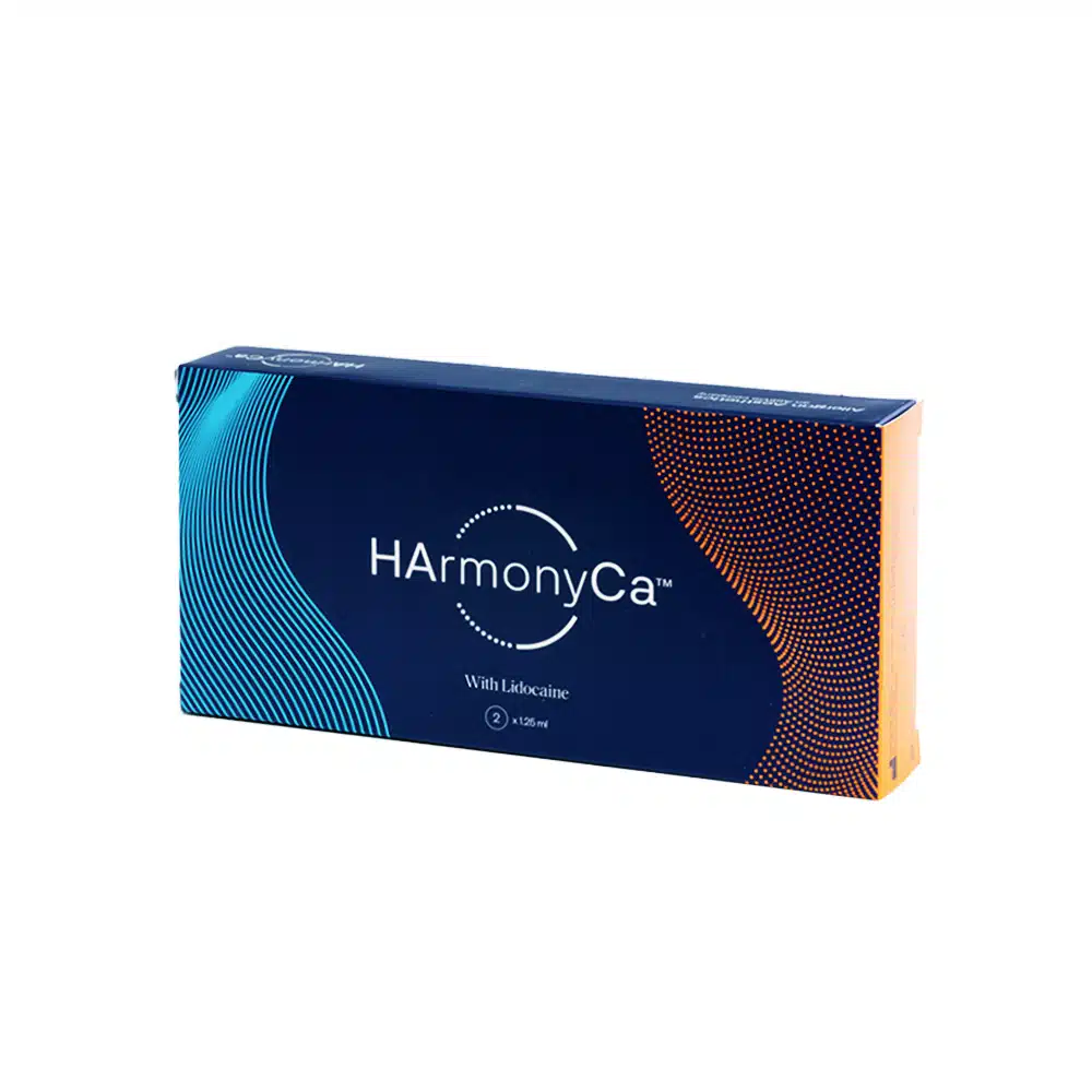 A rectangular, blue package of HArmonyCA™ with Lidocaine, featuring a smooth design with orange and blue wave patterns. The text on the front indicates the product name and mentions Lidocaine. The package has crisp edges and a sleek appearance.
