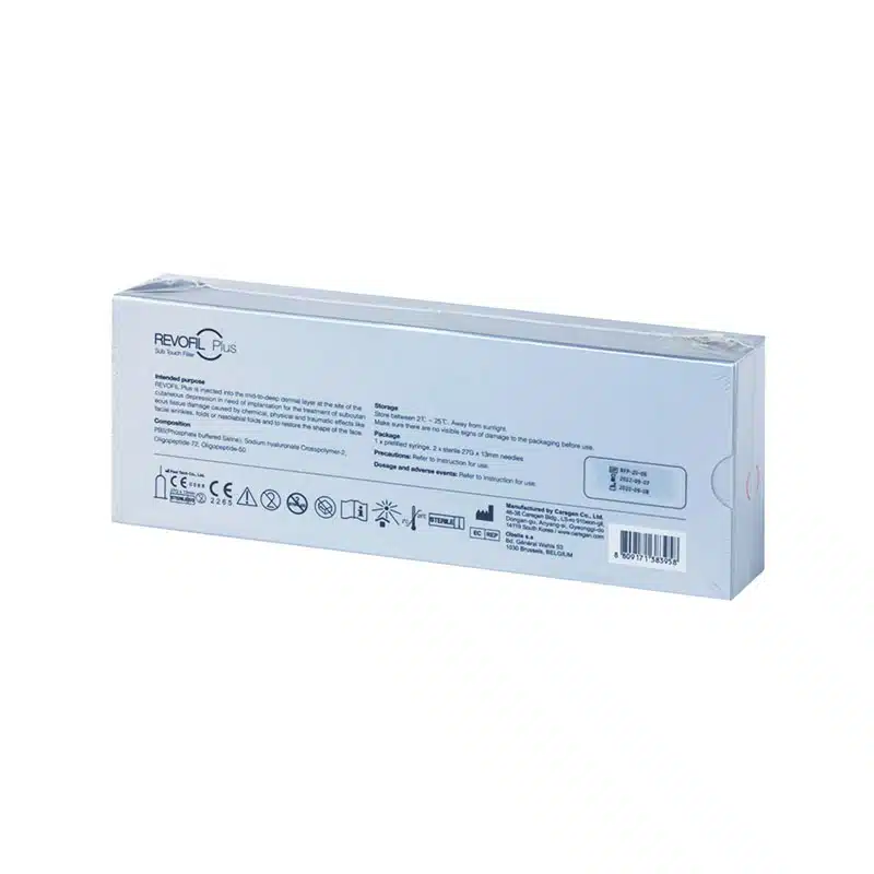 An image of the back of a white rectangular box labeled "REVOFIL AQUASHINE BR SOFT FILLER - 2 Pre-Filled Syringes" with detailed product information, usage instructions, and storage guidelines. Various icons and regulatory labels are also visible along the bottom edge of the box.