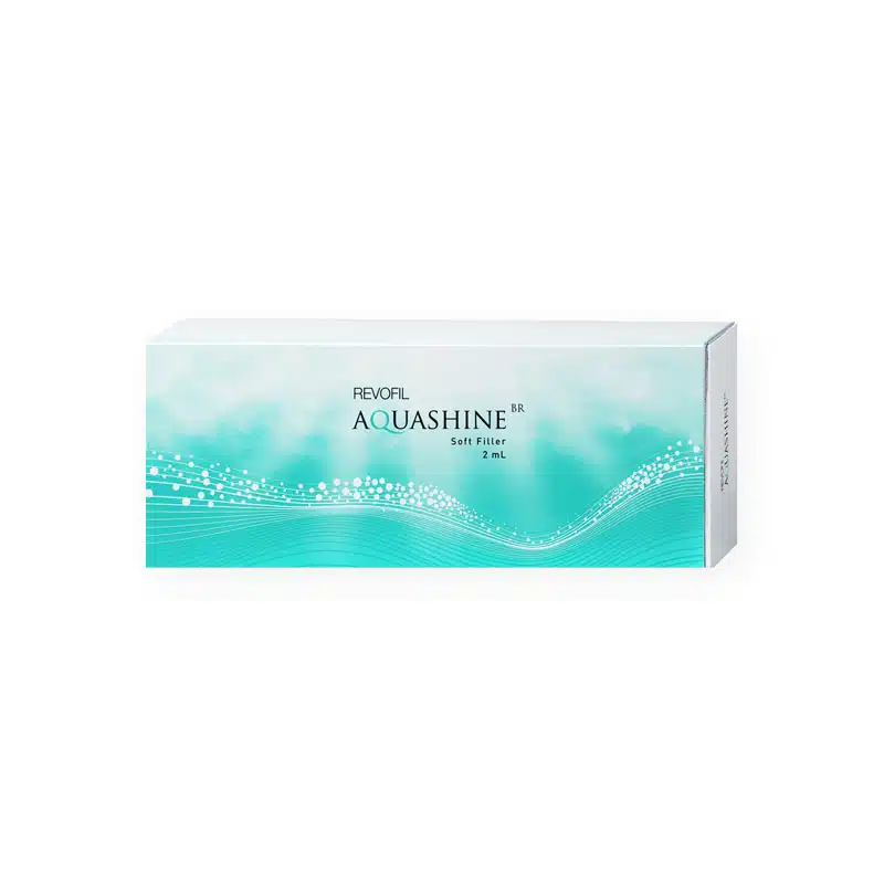 A white and teal box for "REVOFIL AQUASHINE BR SOFT FILLER - 2 Pre-Filled Syringes," with a wave-like design and floating dots on the front. The text and design suggest a medical or cosmetic product. The side of the box is also visible, further indicating branding details.