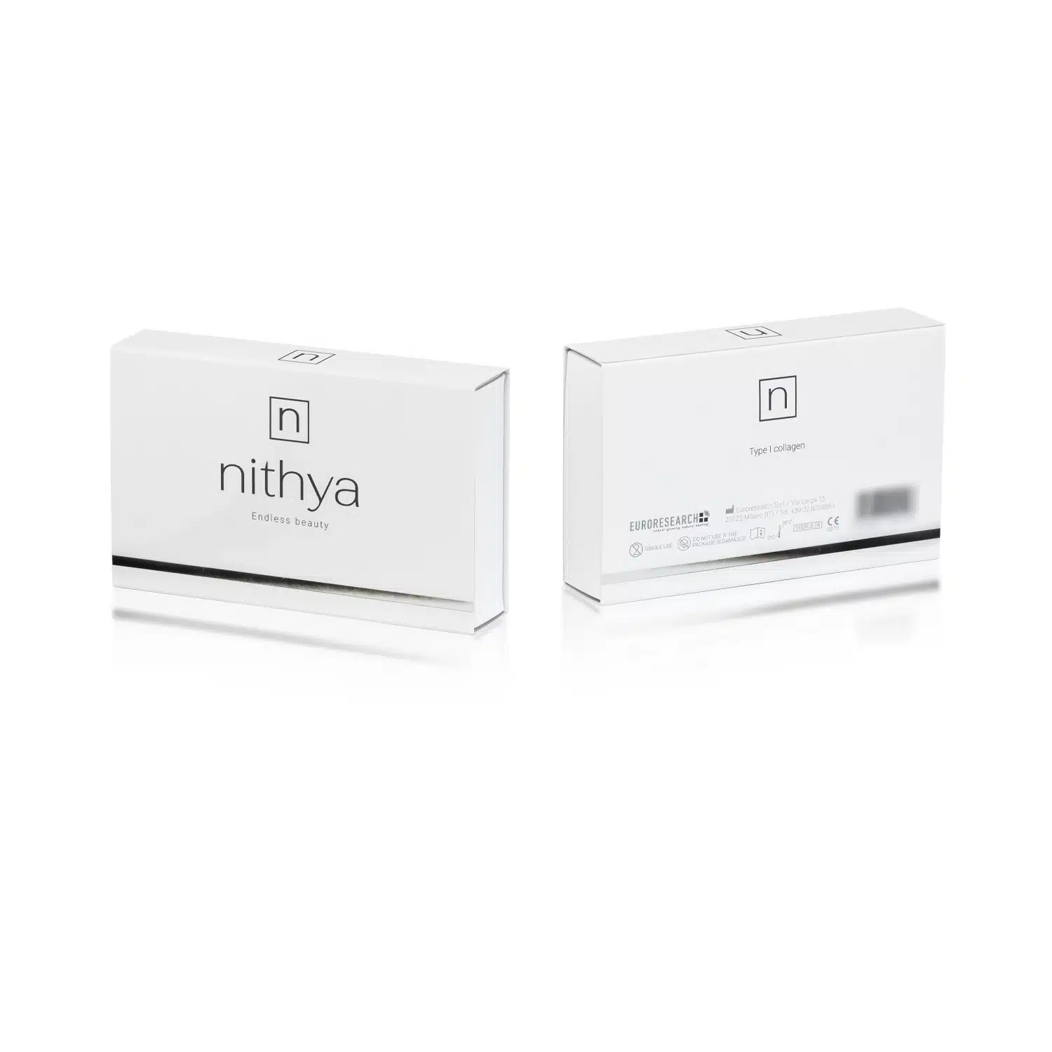 Two white rectangular boxes of NITHYA ENDLESS BEAUTY, a beauty product, are standing on a white surface. One box shows the front side with the NITHYA ENDLESS BEAUTY logo and "Endless Beauty" tagline, while the other displays the back side with product details and barcodes.