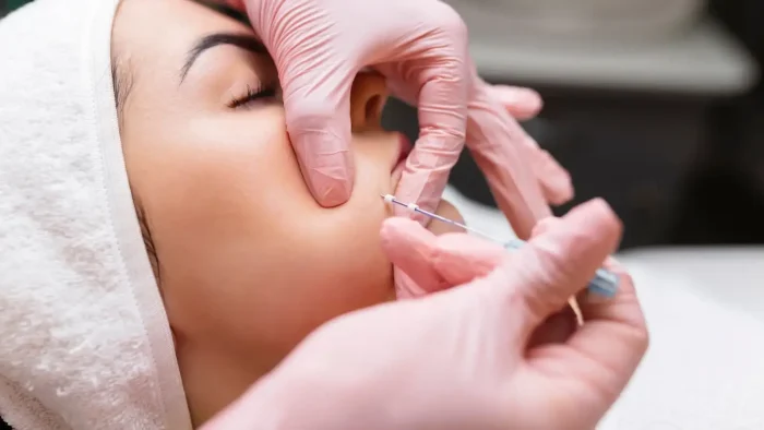 Facial threadding.