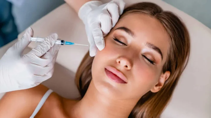 Woman with facial injection.