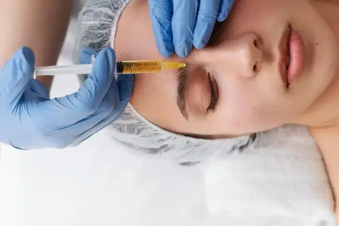 Person getting injection.